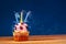 Birthday cake with three blown up candles