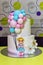 Birthday cake whit little girl and balloons