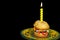 birthday candle in hamburger cake