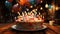 Birthday celebration candlelit party, gourmet cake, joyful gifts, sweet treats generated by AI