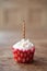 Birthday cupcake blurry background with lots of lit candles