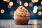 Birthday cupcake with burning candle, closeup, light background