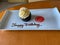 A birthday cupcake delivered to a cruise ship passenger wishing them a Happy Birthday