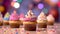 birthday cupcakes with blur background colorful balloons. Generative Ai