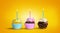 Birthday cupcakes with burning candles on a yellow background