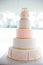 Birthday five-tiered white and pink cake