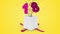 Birthday gift exploding with confetti and balloon eighteen against yellow background