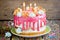 Birthday naked cake with pink chocolate