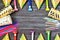 Birthday party background.Decoration for the party. design concept. Candles, confetti, candies and party supplies on wooden backgr