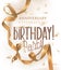Birthday party banner with long curly golden ribbon.