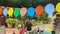 A birthday party in the garden with felt balloons on a string