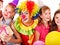 Birthday party group of teen with clown.