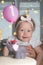 Birthday party of little baby girl. Birthday party background. Happy childhood concept. Family holiday idea. Portrait of