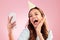 Birthday, selfie and excited with a woman in studio on a pink background for the celebration of an event. Phone, social