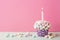 Birthday vanilla cupcake with colorful marshmallows