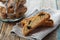 Biscotti or cantucci with raisins on wooden rustic table, traditional Italian biscuit