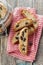 Biscotti or cantucci with raisins on wooden rustic table, traditional Italian biscuit or cookie