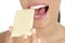 Biscuit in woman teeth and mouth, healthy snack