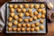 biscuits arranged on parchment-lined baking sheet