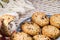 biscuits with a bite and copy space, plate firm hand holding, copy space left