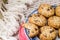 biscuits with a bite and copy space, plate firm hand holding, copy space left