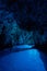 Bisevo, Croatia - Aug 16, 2020: Tourists on a boat in serene blue cave near Komiza island