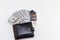 Bishkek, Kyrgyzstan - February 17, 2019: Black wallet, hundred dollar bills and credit cards visa and master card on white