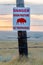 Bison crossing sign in a bison pasture near Swift Current, Saskatchewan