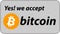 Bitcoin accepted sign on grey background.