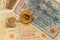 Bitcoin with ancient deutsch money. Cryptocurrency concept background. Closeup with copy space.
