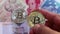 Bitcoin and banknote of Asia groups, such as Thailand, china, Vietnam, and Malaysia. Virtual money concept.