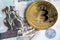 Bitcoin BTC coin virtual money on Russian Rubles banknotes. BTC RUB