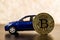 Bitcoin coin and auto. Cryptocurrency economy money.