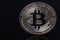 Bitcoin coin on a black background. Crypto currency.