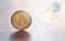 Bitcoin coin and bursting soap bubble