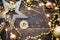 Bitcoin coin in the festive decor for Christmas and new year. Cryptocurrency, finance, wealth and investing. Fairy lights,