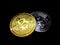 Bitcoin coin gold and silver color on black background, stack of bitcoin coin golden over bitcoin coin silver, cryptocurrency