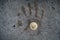 Bitcoin coin in handprint