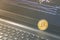 Bitcoin coin placed on black notebook . Close-Up Bitcoin , exchange virtual value, crypto digital money . Background Live Stock