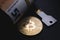 Bitcoin coin, usb memory card in the form of a key and a roll of money. Soft focus