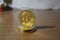 Bitcoin coin on a wooden table background. Cryptocurrency