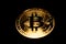Bitcoin coins piled up Gold coins on dark background. Crypto currency and Block chain technology concept. Digital Money
