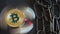 Bitcoin Crypto Currency, rotating mirror surface, red laser and chain