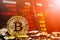 Bitcoin cryptocurrency stock trading background concept. Golden bitcoin over many international money coins with abstract trading