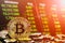 Bitcoin cryptocurrency stock trading background concept. Golden bitcoin over many international money coins with abstract trading