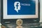 Bitcoin in front of an facebook photo, facebook open up bitcoin adds, cryptocurrency