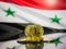 Bitcoin gold coin and defocused flag of Syria background. Virtual cryptocurrency concept.