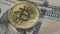 Bitcoin Golden Coin on 100 Dollar Banknote, Close Up. Cryptocurrency Concept