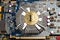 Bitcoin golden coin on graphic card motherboard chip