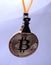 Bitcoin hanging on a metal peg